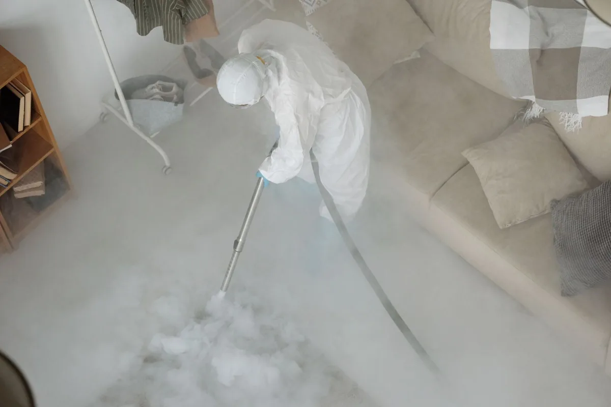 Biohazard cleanup technician in protective equipment, Orangeburg, NY